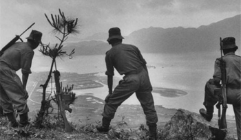 Hong Kong border guards catching illegals from Guangdong before 1980